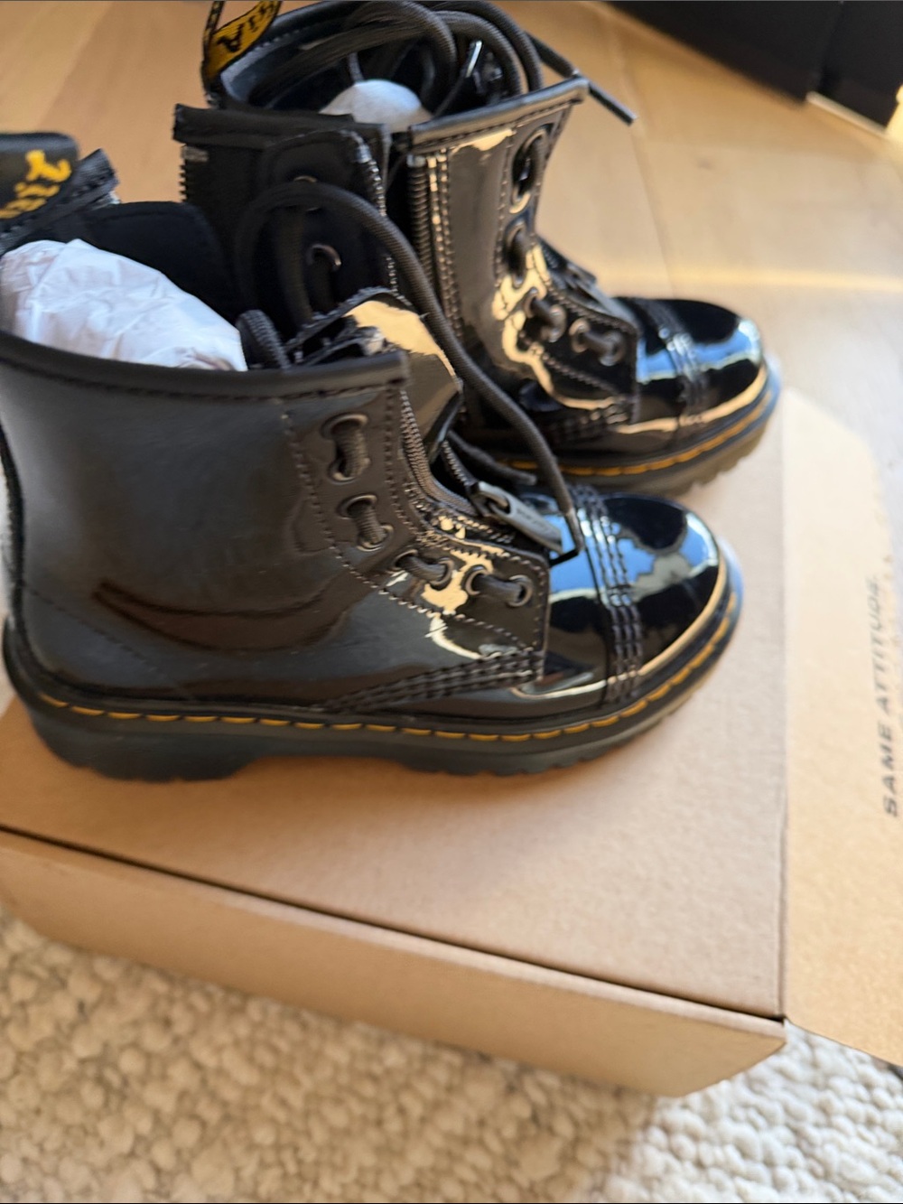 Dr. Martens Kids Black Patent Lace-Up Boots with Yellow Stitching